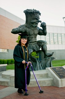 Megan at graduation with Wu.